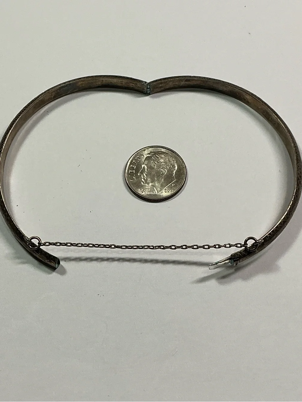 Sterling Silver Etched Design Hinged Bracelet. 2 & 3/8 inch diameter